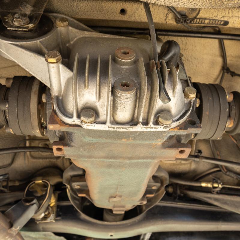 Close-up of vehicle driveline & differential used in transfer case inspection in Fort Lauderdale, FL