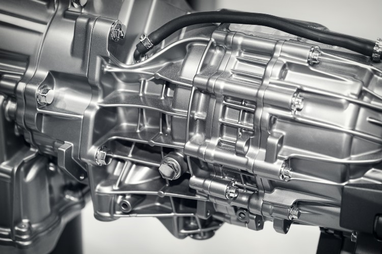 A Dual-Clutch Transmission Assembly Showing Metal Housing, Bolts, and Tubing in Fort Lauderdale, FL 