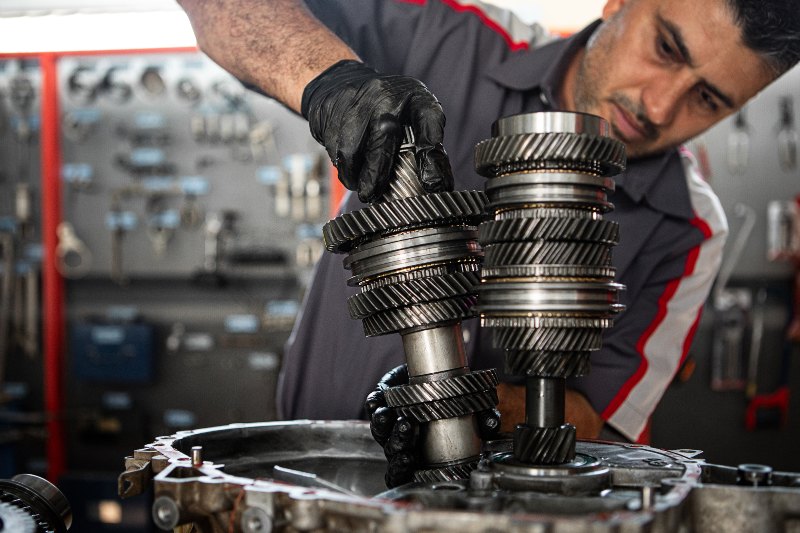 Technician repairing gear in Fort Lauderdale and Davie, FL